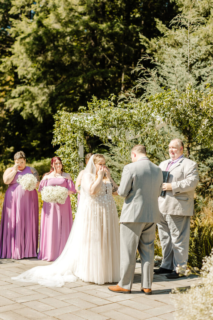 bride cries during ceremony