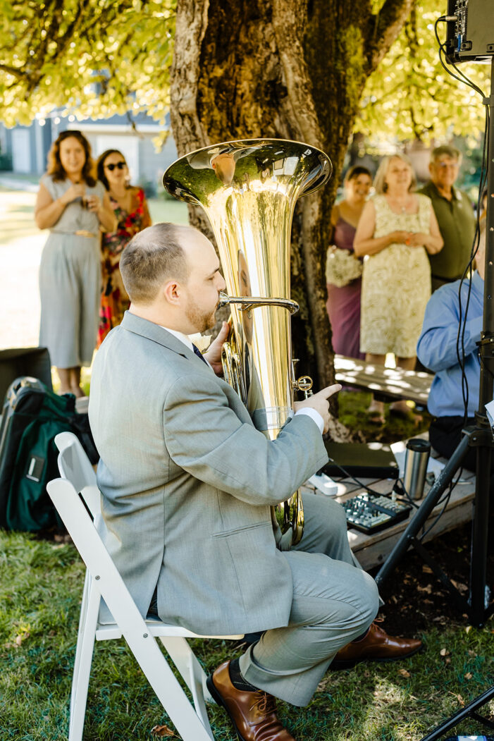 groom plays the trumpet