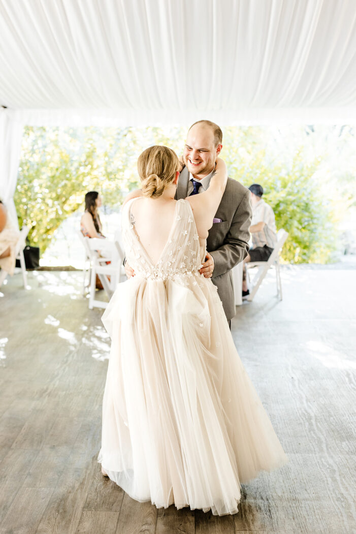 bride and groom share first dance