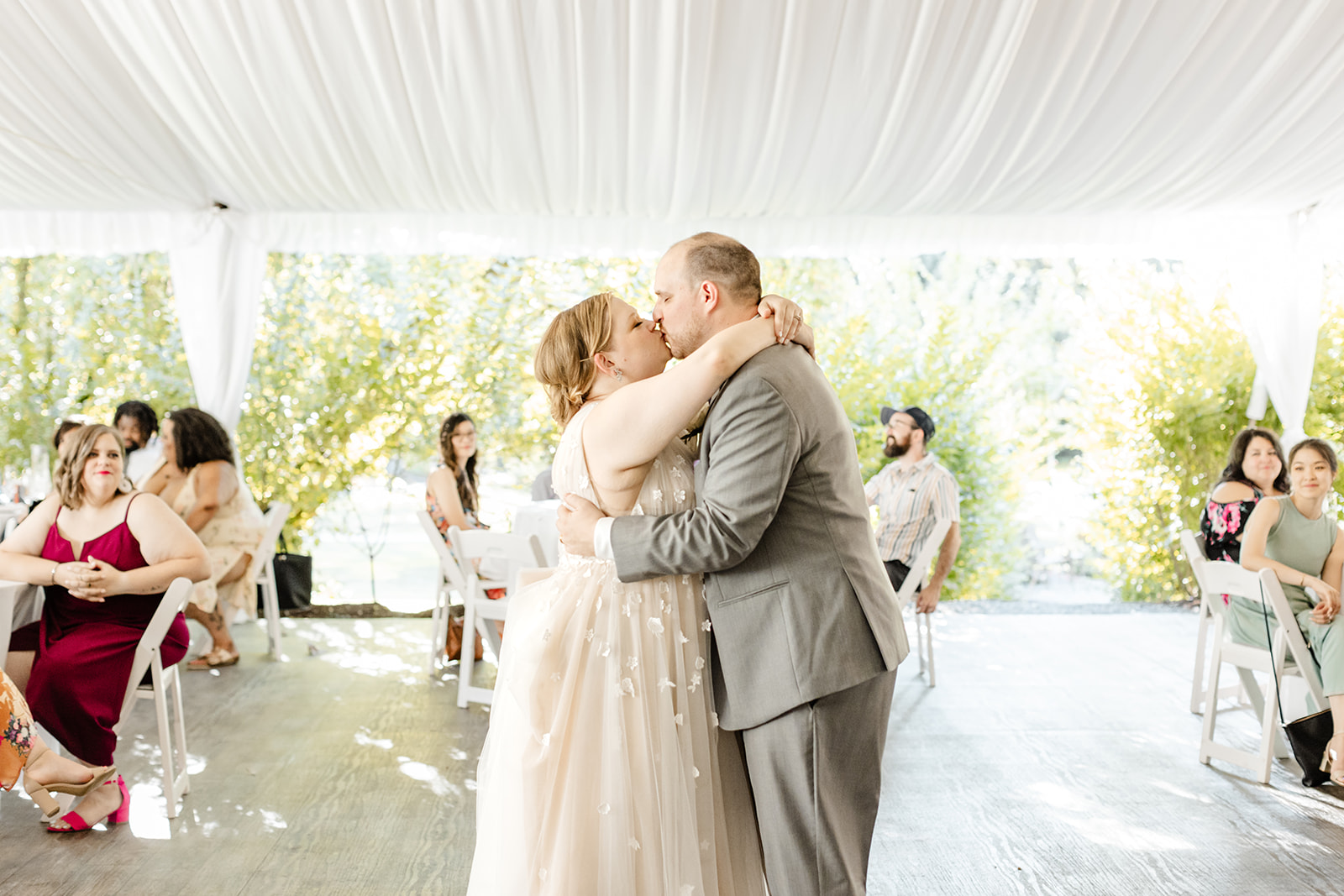 bride and groom sharing first dance