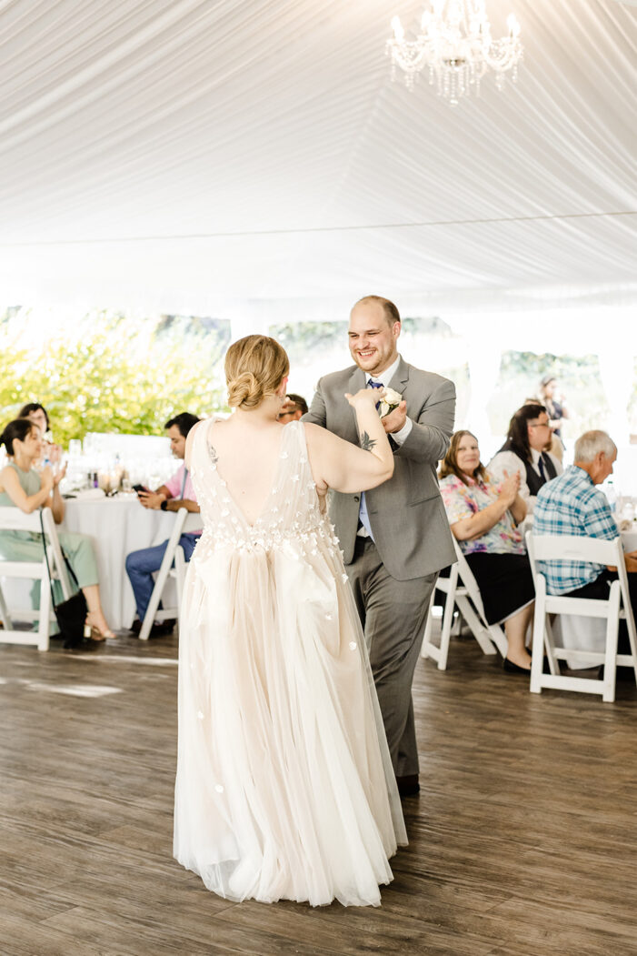 bride and groom share first dance