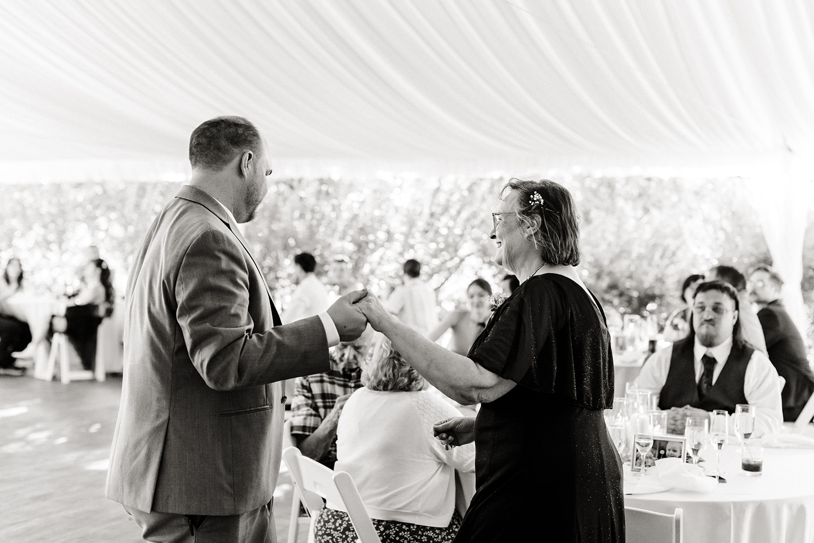 groom and mom share first dance