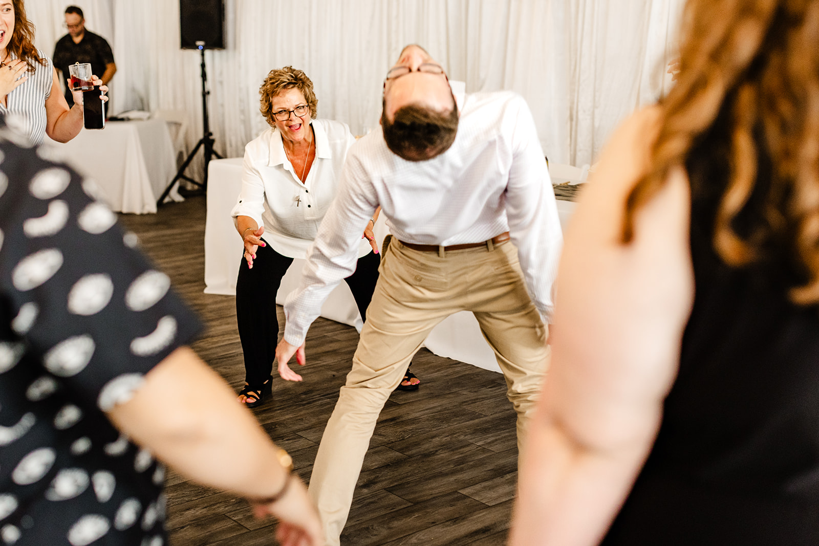 guests dance at evergreen meadows wedding