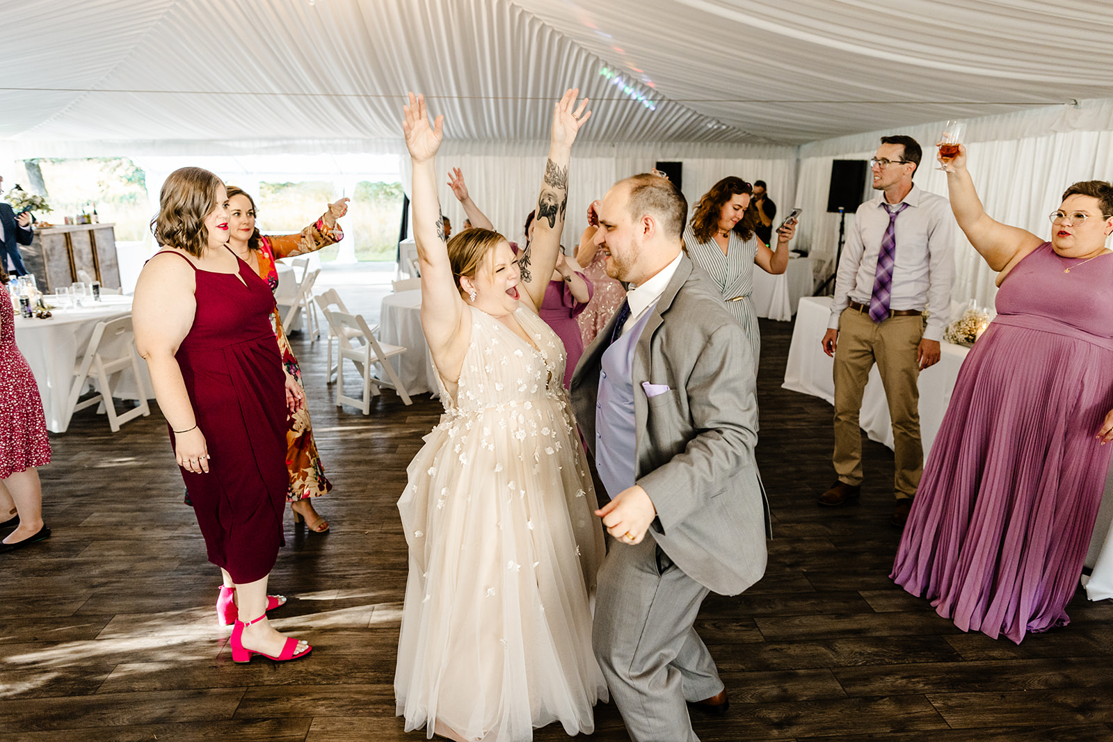 guests dance at evergreen meadows wedding