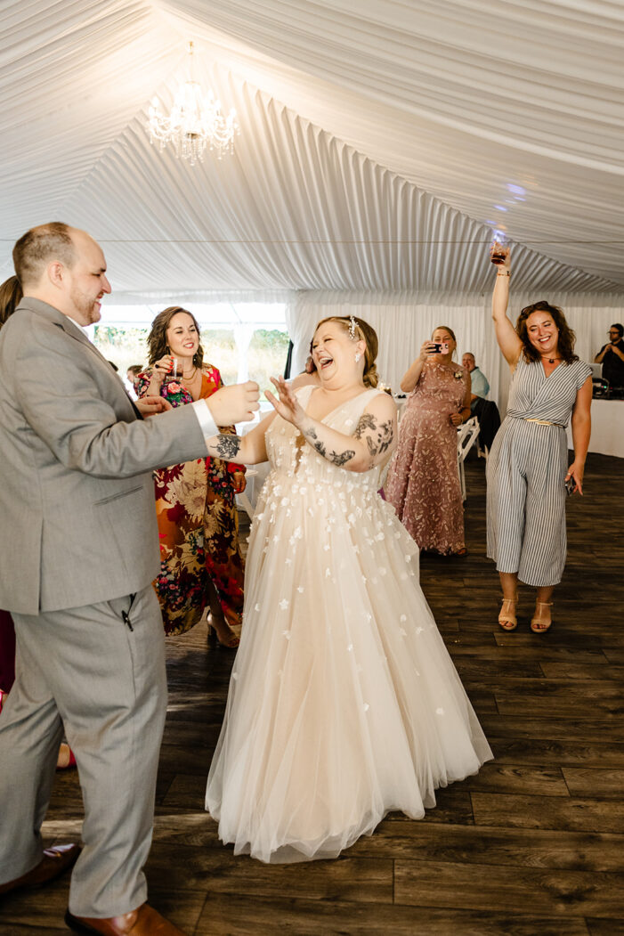 guests dance at evergreen meadows wedding