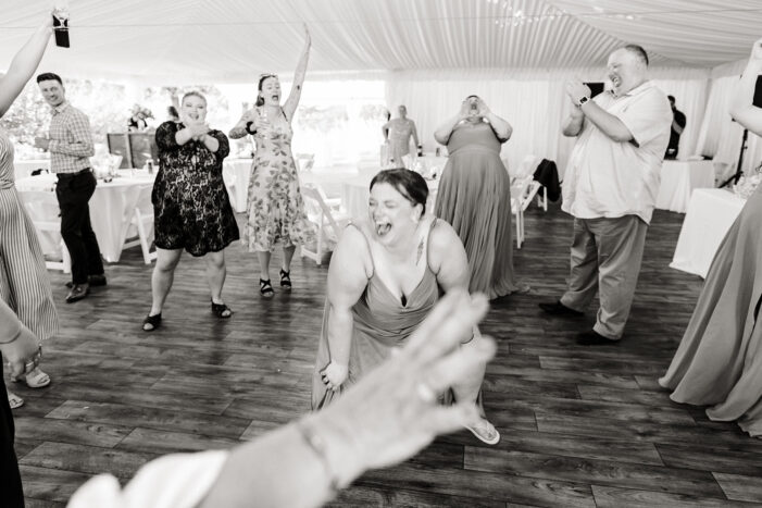 guests dance at evergreen meadows wedding