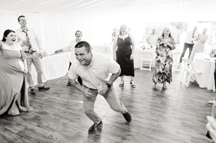 guests dance at evergreen meadows wedding