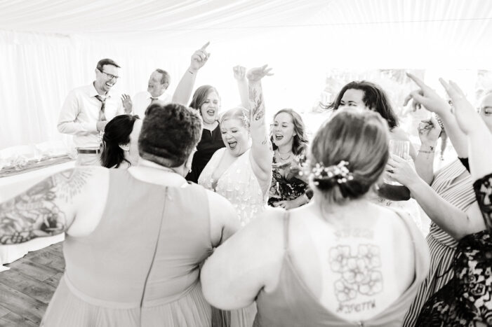 guests dance at evergreen meadows wedding