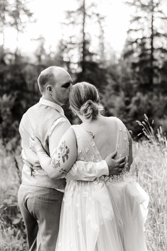 bride and groom pose together