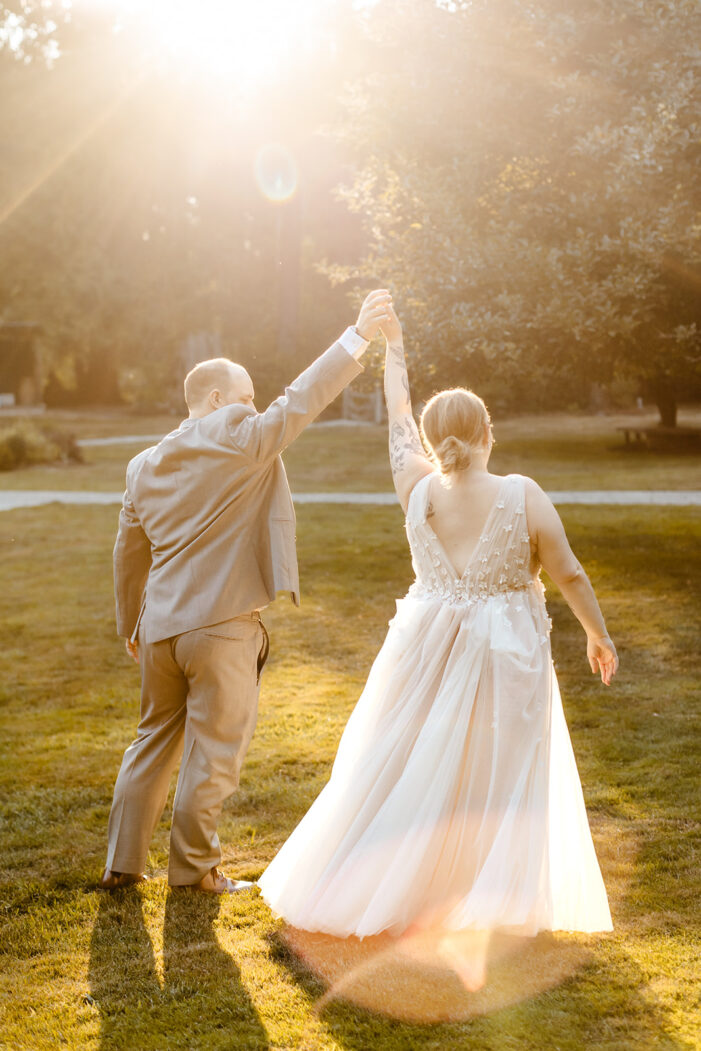 groom spins bride