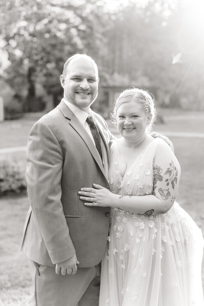 bride and groom smile together