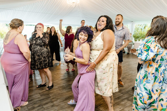 guests dance at evergreen meadows wedding