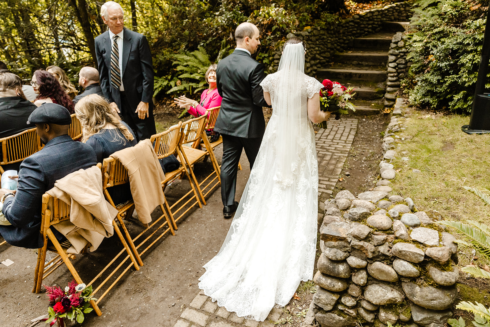 bride and groom walk out of ceremony together