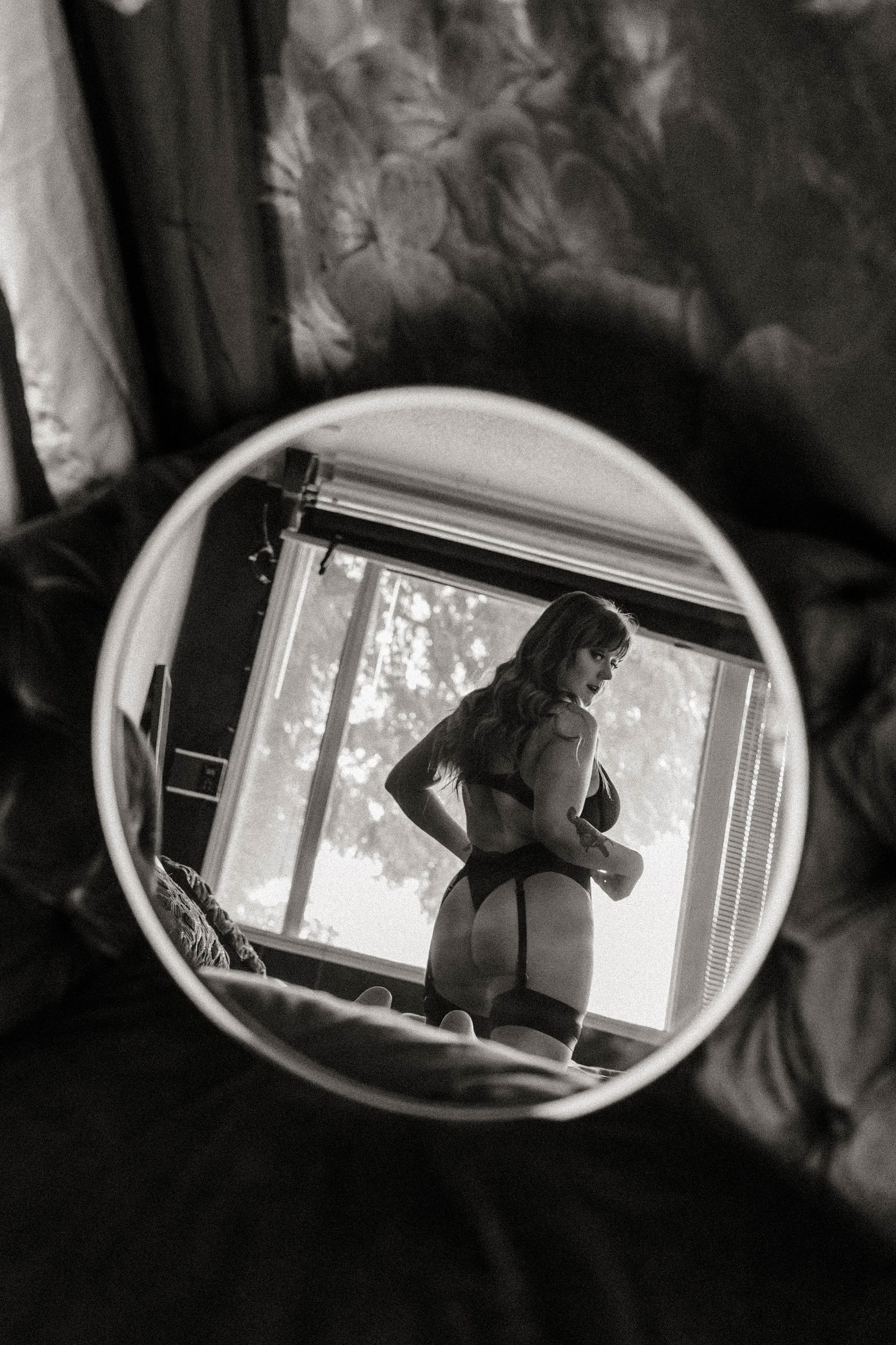 seattle boudoir photographer mirror reflection of woman looking
