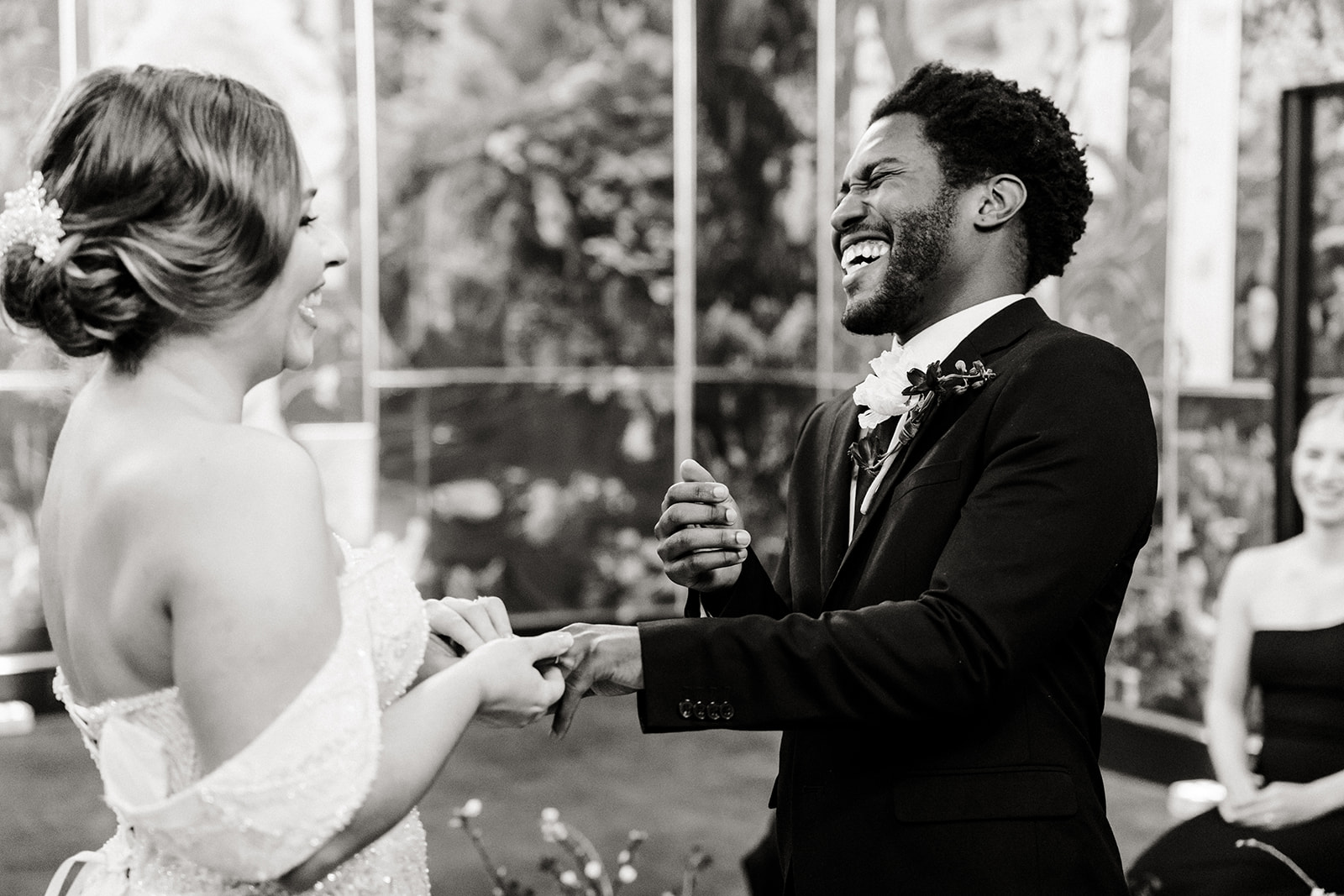 bride and groom laugh together
