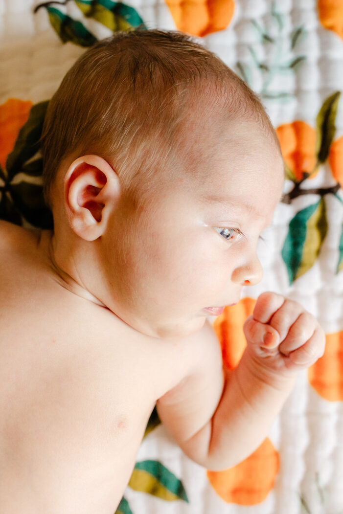 little baby with closed fist