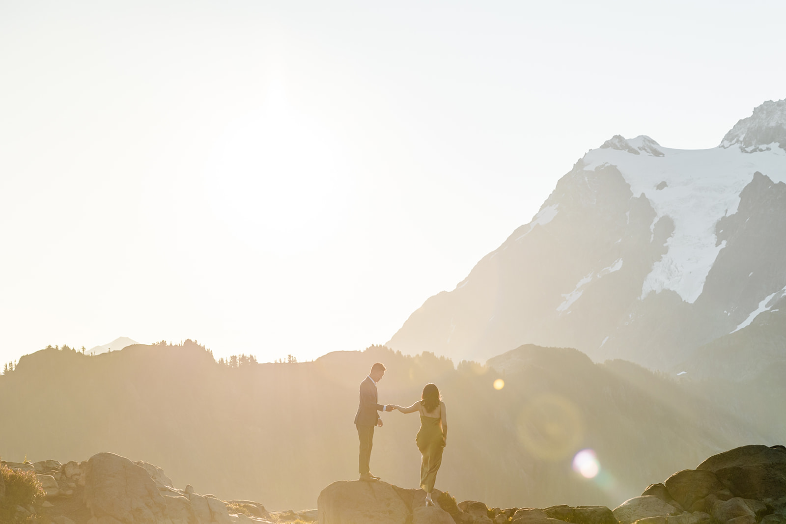 couple poses for engagement session at artist point mount baker