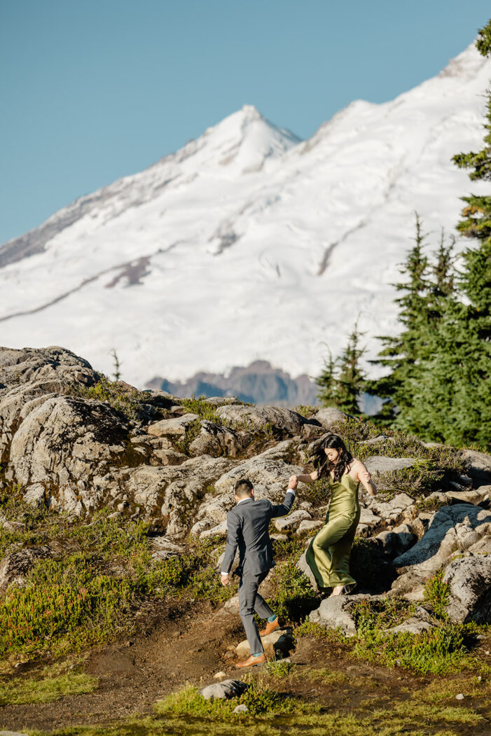 couple poses for engagement session at artist point mount baker