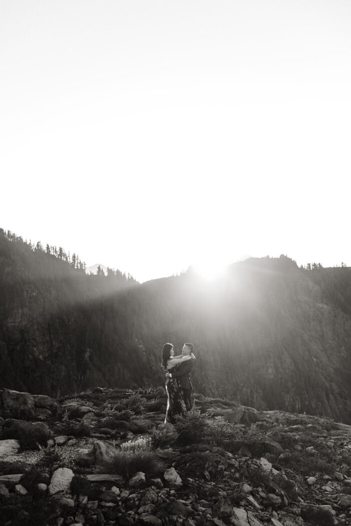 couple poses for engagement session at artist point mount baker