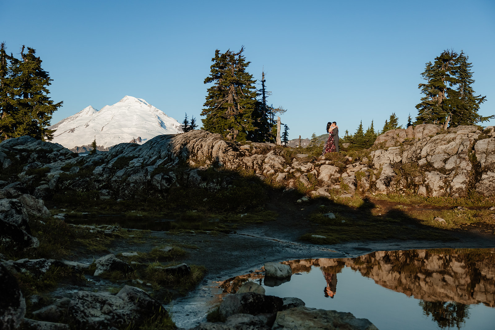 couple poses for engagement session at artist point mount baker