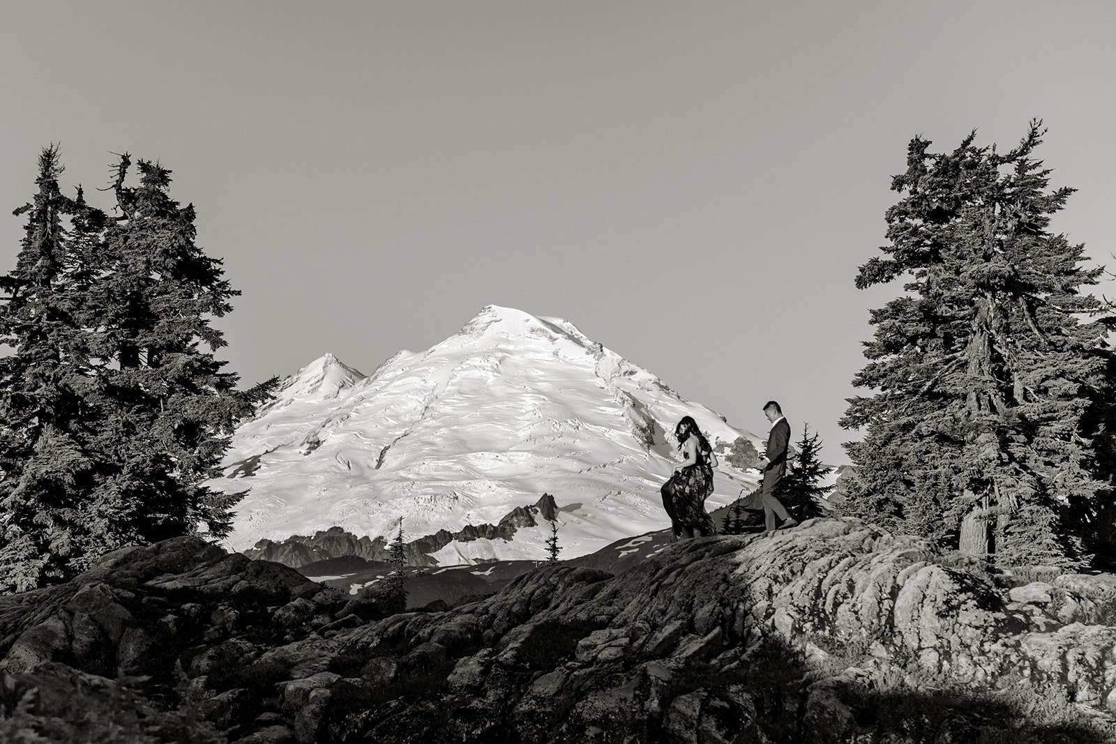 couple poses for engagement session at artist point mount baker