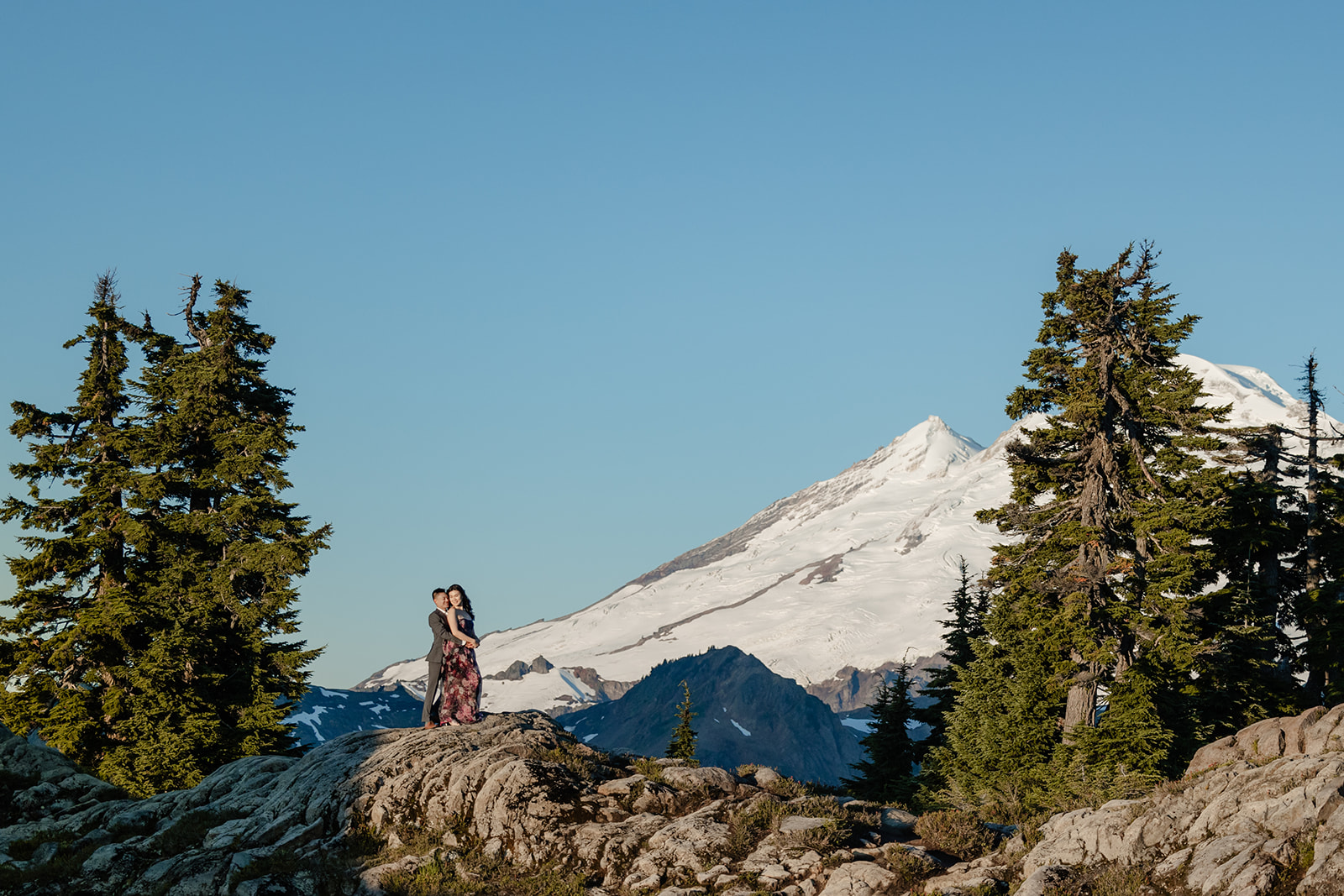 couple poses for engagement session at artist point mount baker