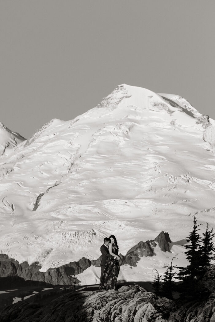 couple poses for engagement session at artist point mount baker