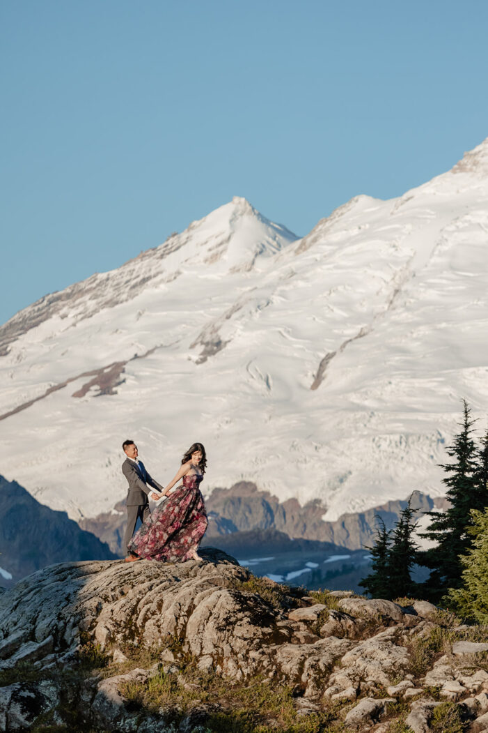 couple poses for engagement session at artist point mount baker