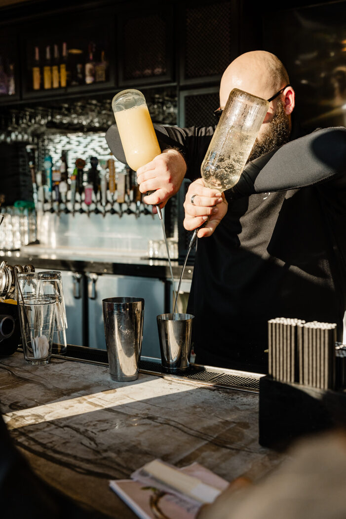 baretender pouring drinks