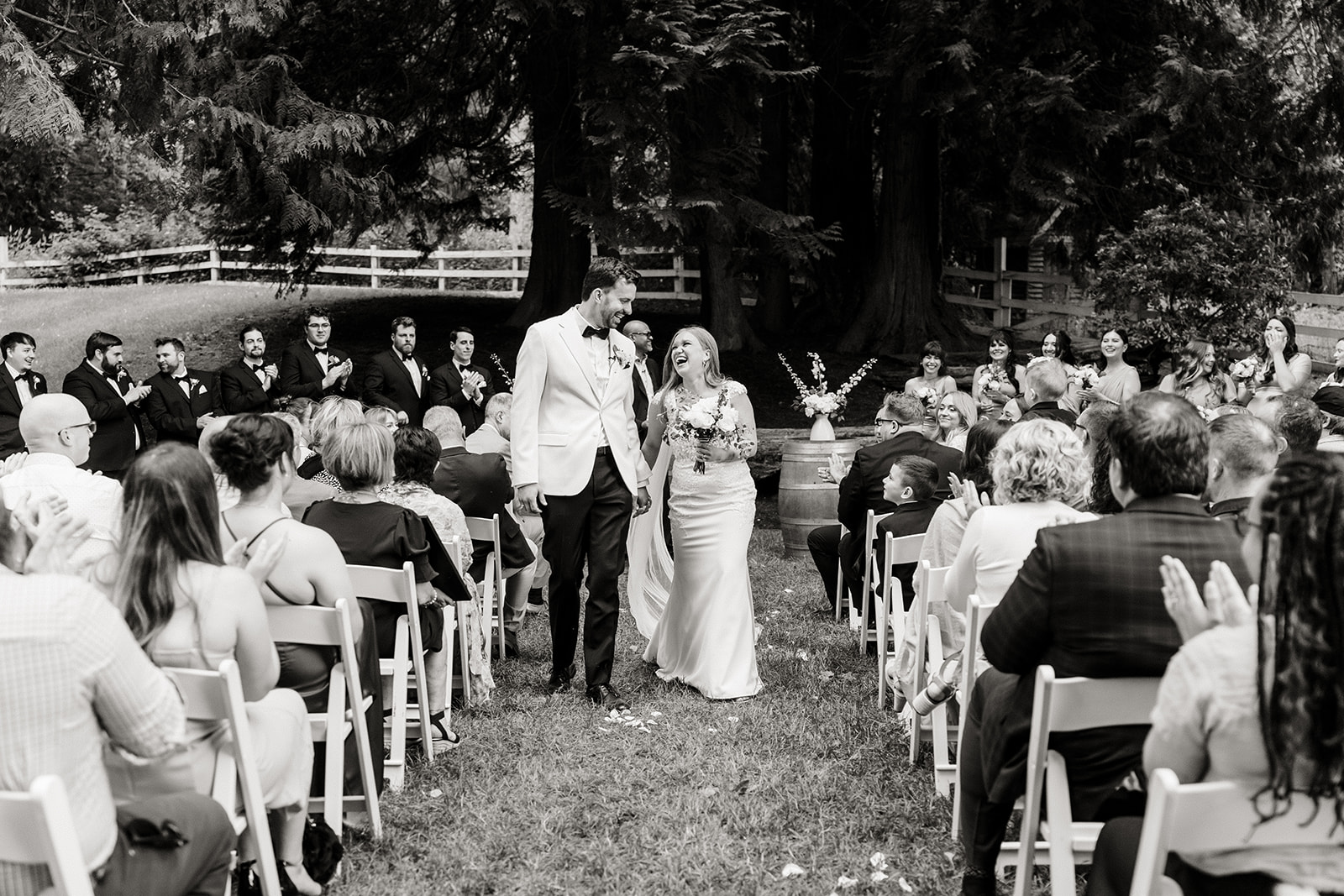 bride and groom walk back up aisle 