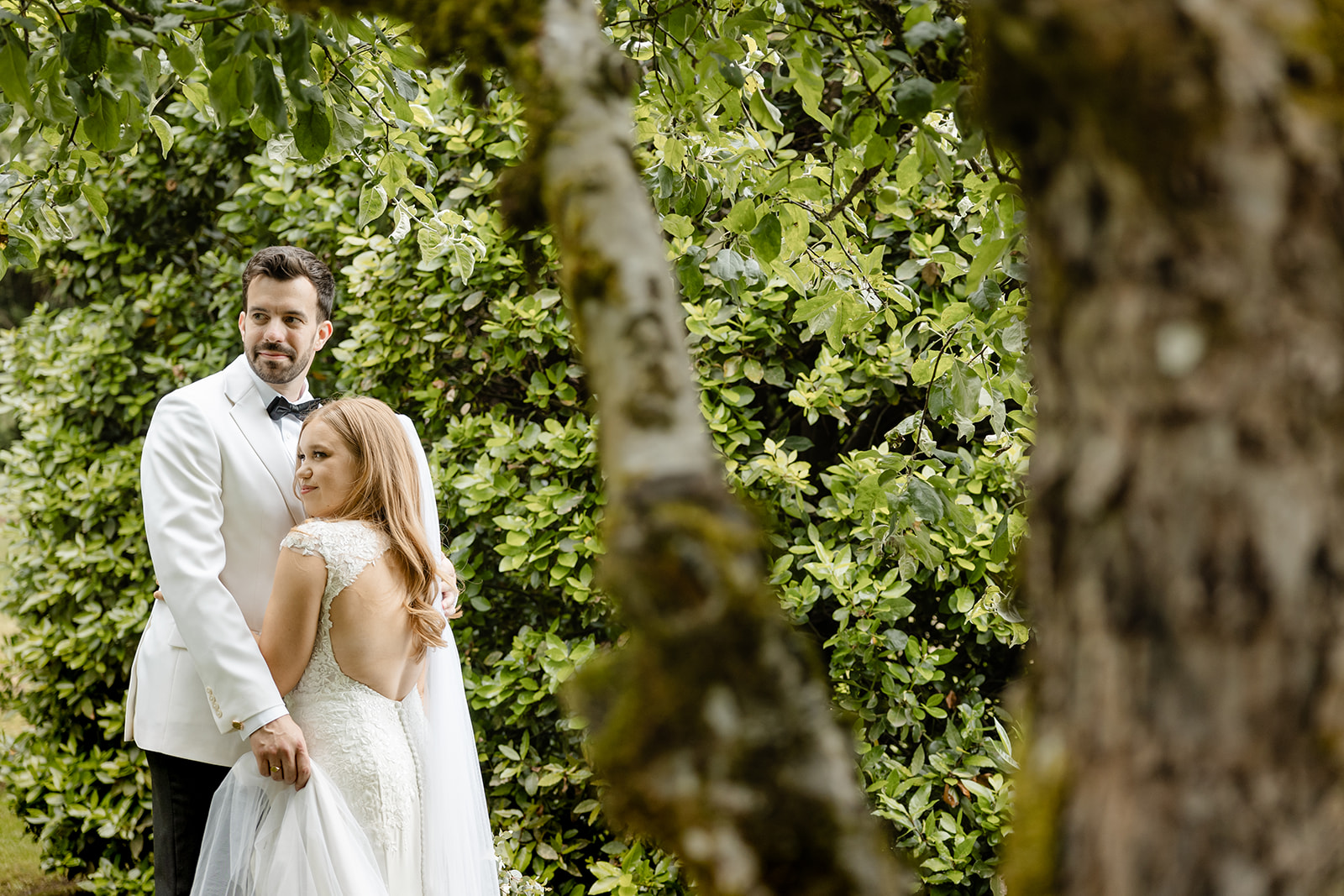bride and groom embrace