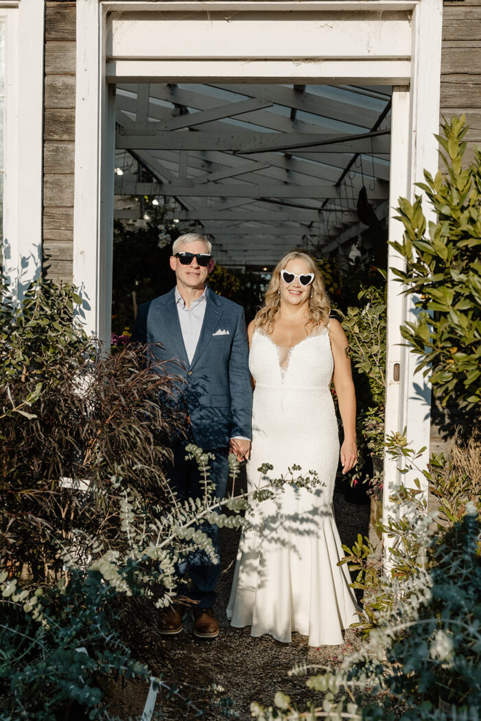 bride and groom at Christianson's plant nursery