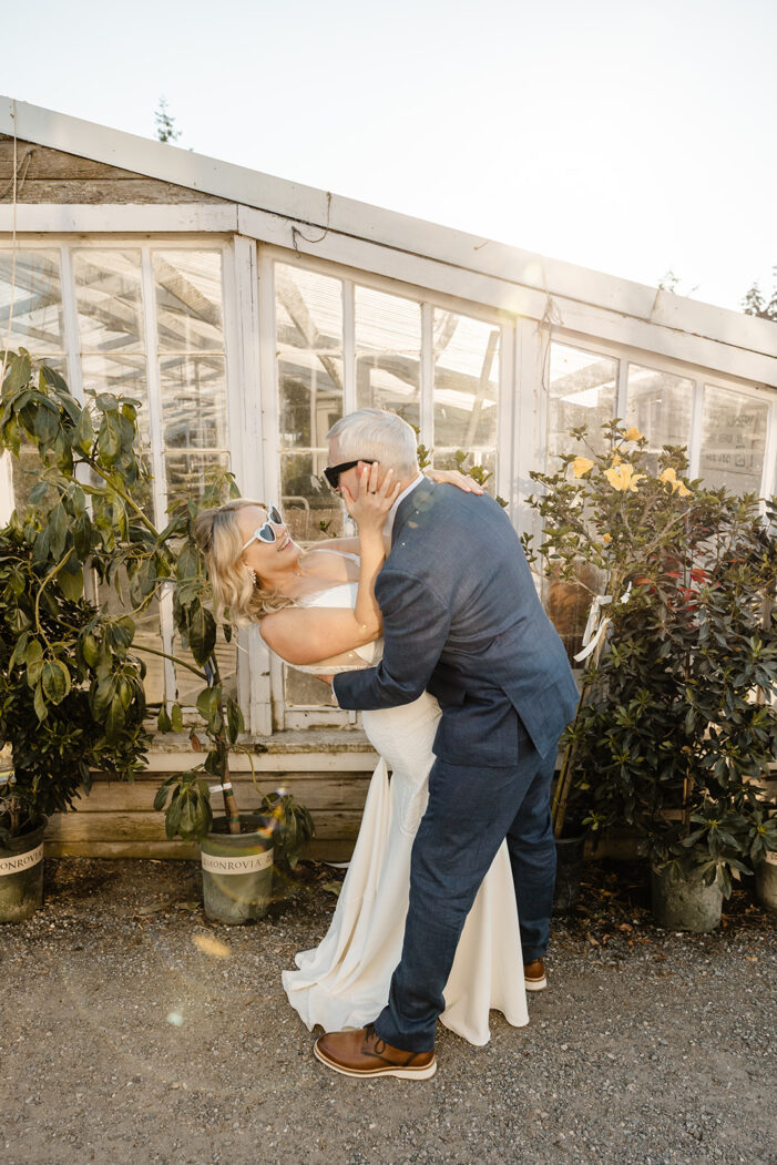 bride and groom at Christianson's plant nursery