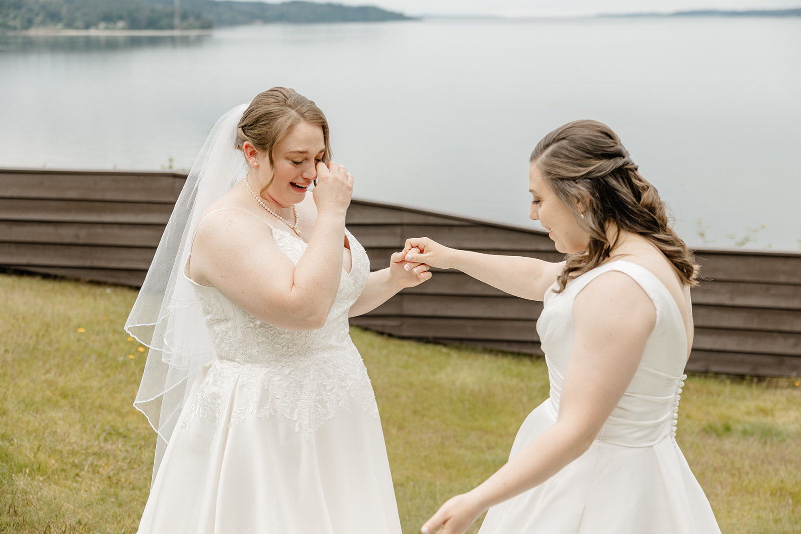 bride cries looking at other bride