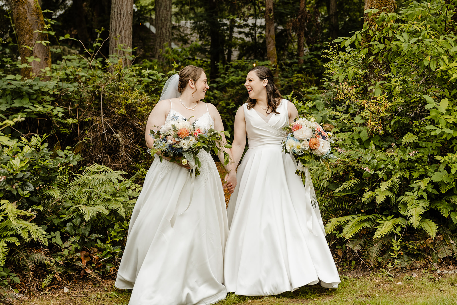 brides walking together out of forest
