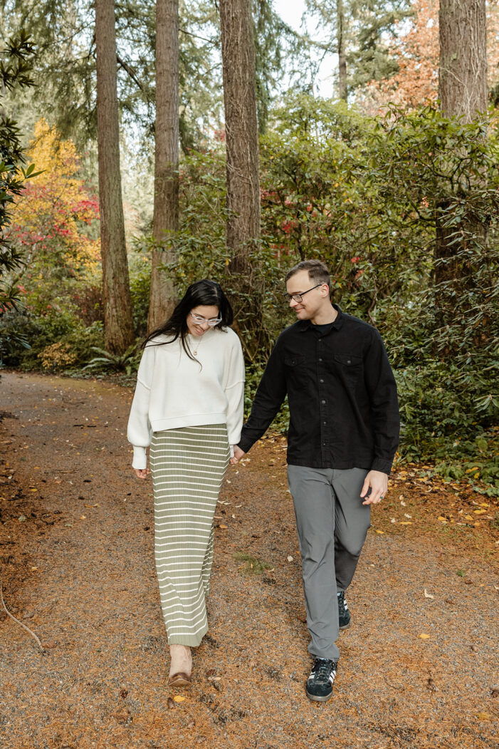 couple walks through lakewold gardens
