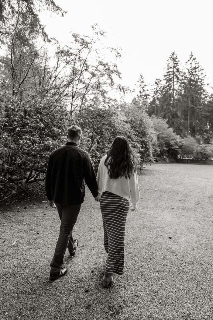 couple walks through lakewold gardens