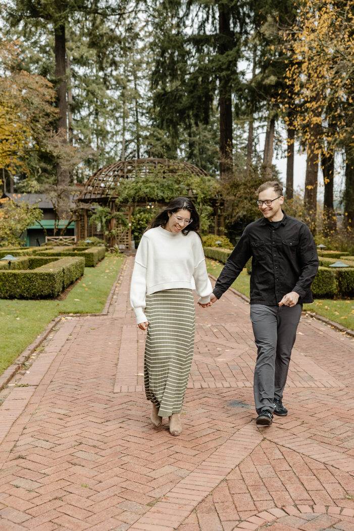 couple walks through lakewold gardens
