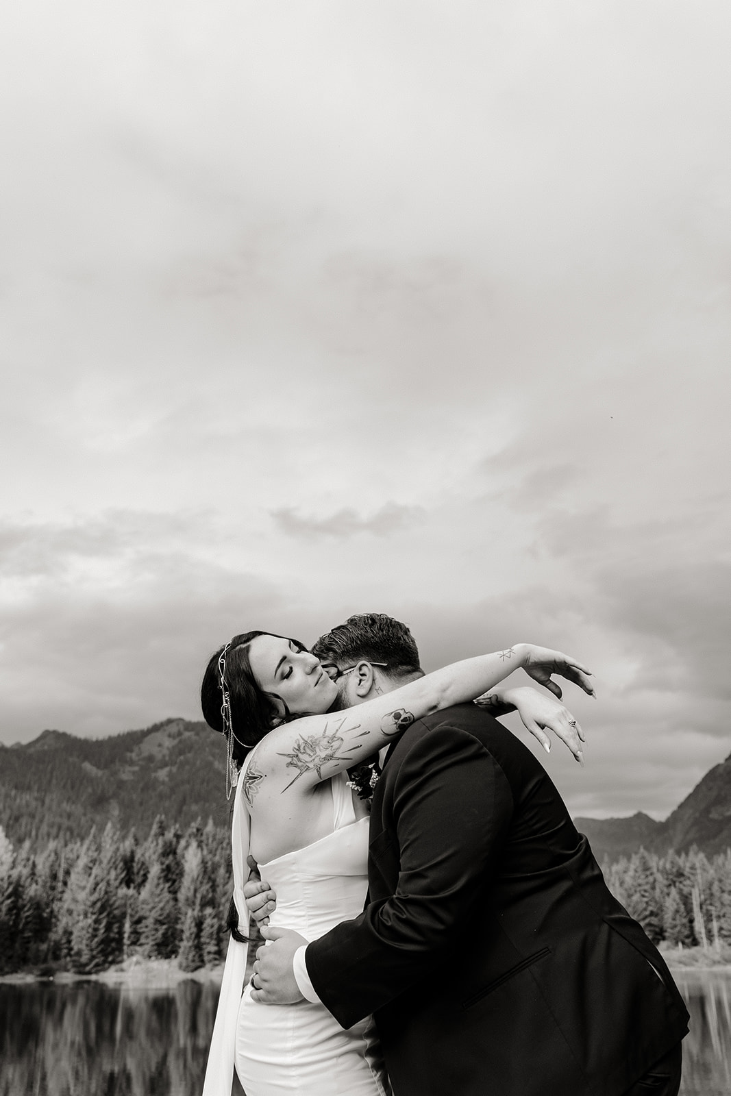 bride and groom embrace
