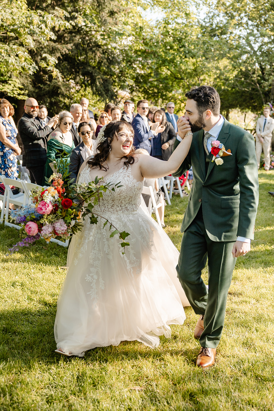 bride and groom walking up aisle