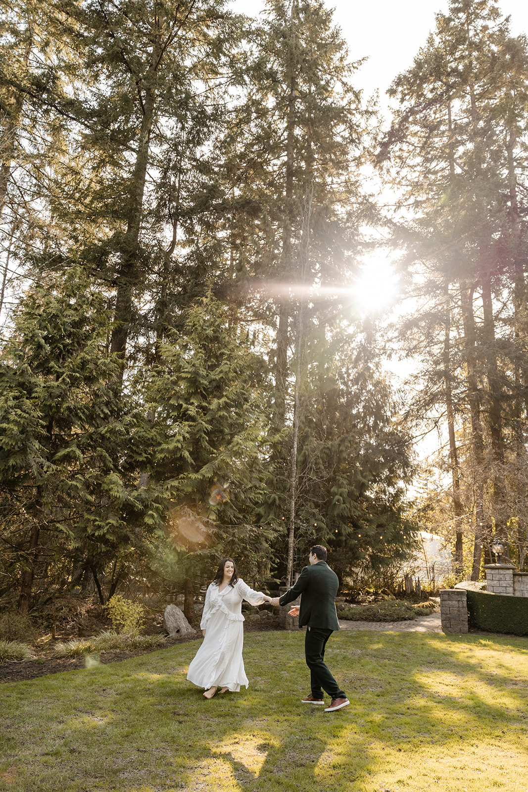 man and woman engagement session in garden