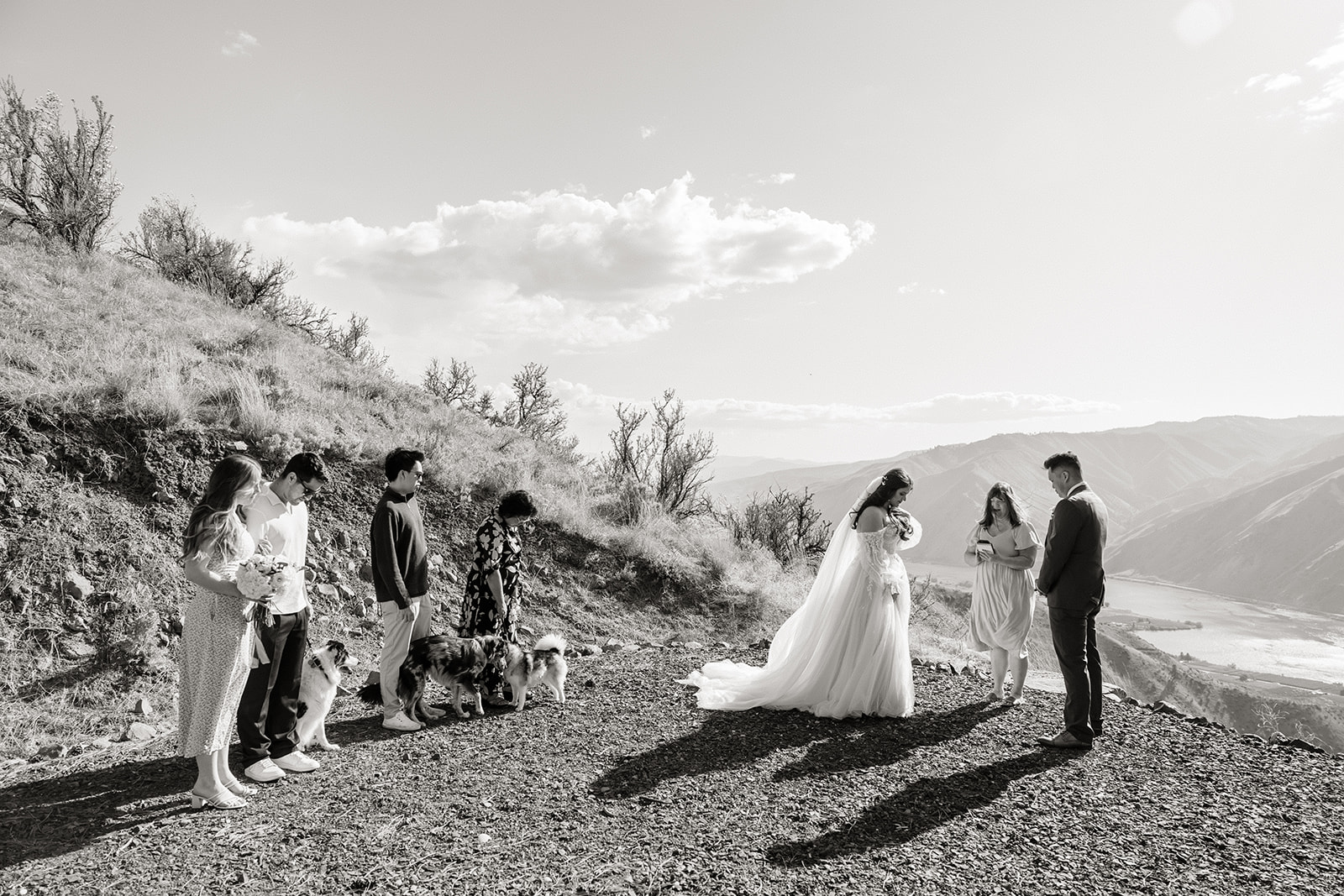 bride and groom get married on a cliffside