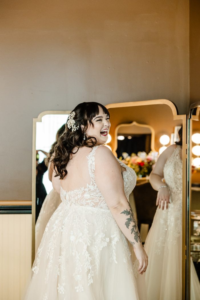 bride smiling over shoulder