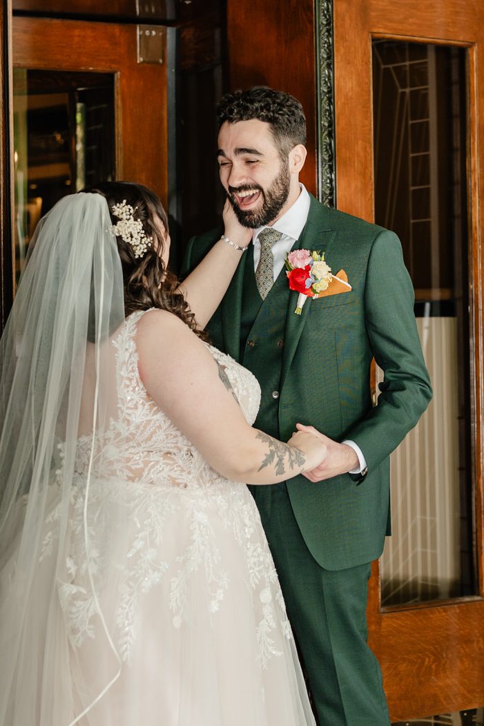 bride and groom share a first look