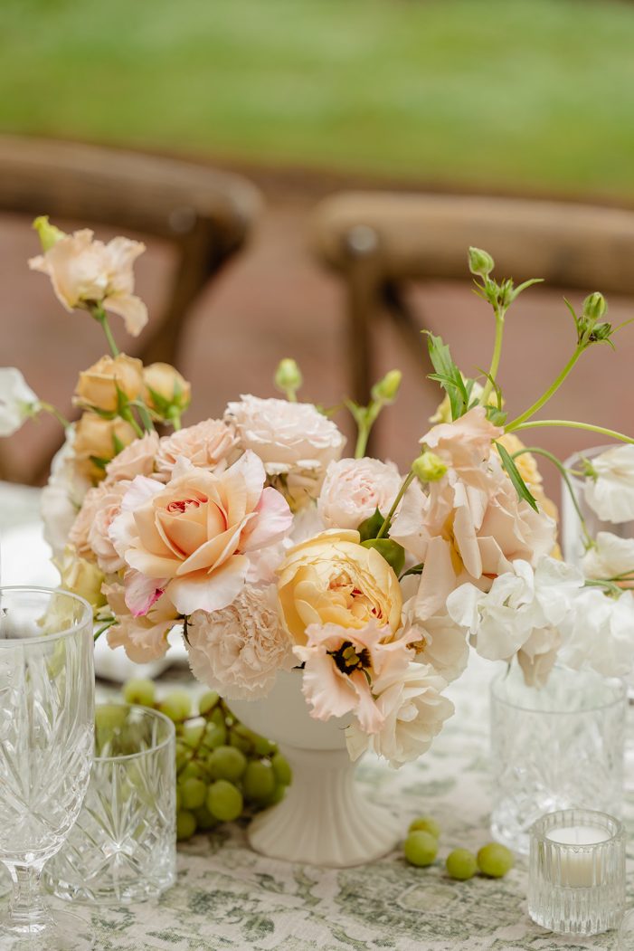 table under awning at lakewold gardens