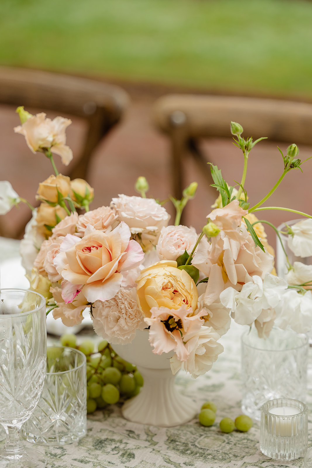 table under awning at lakewold gardens
