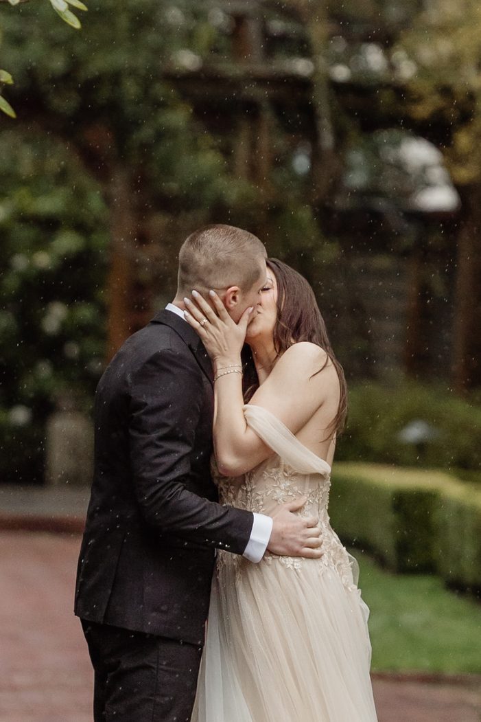 bride and groom walk through lakewold gardens
