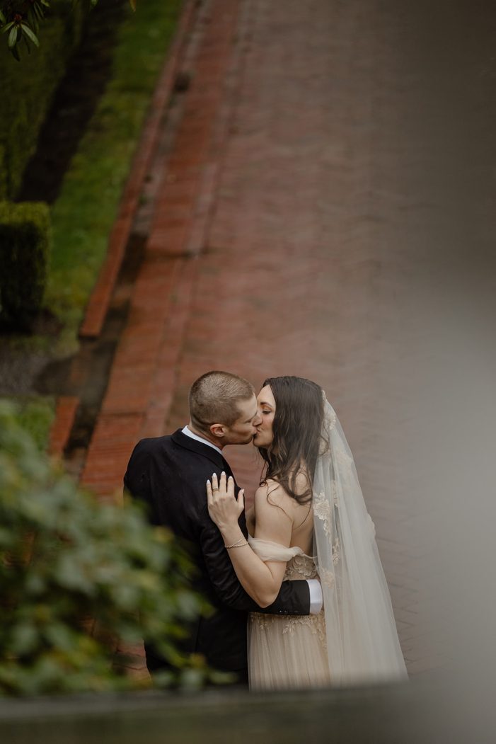 bride and groom walk through lakewold gardens