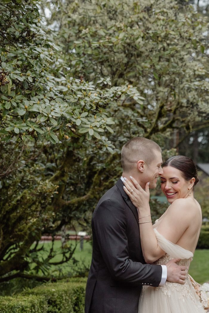 bride and groom walk through lakewold gardens