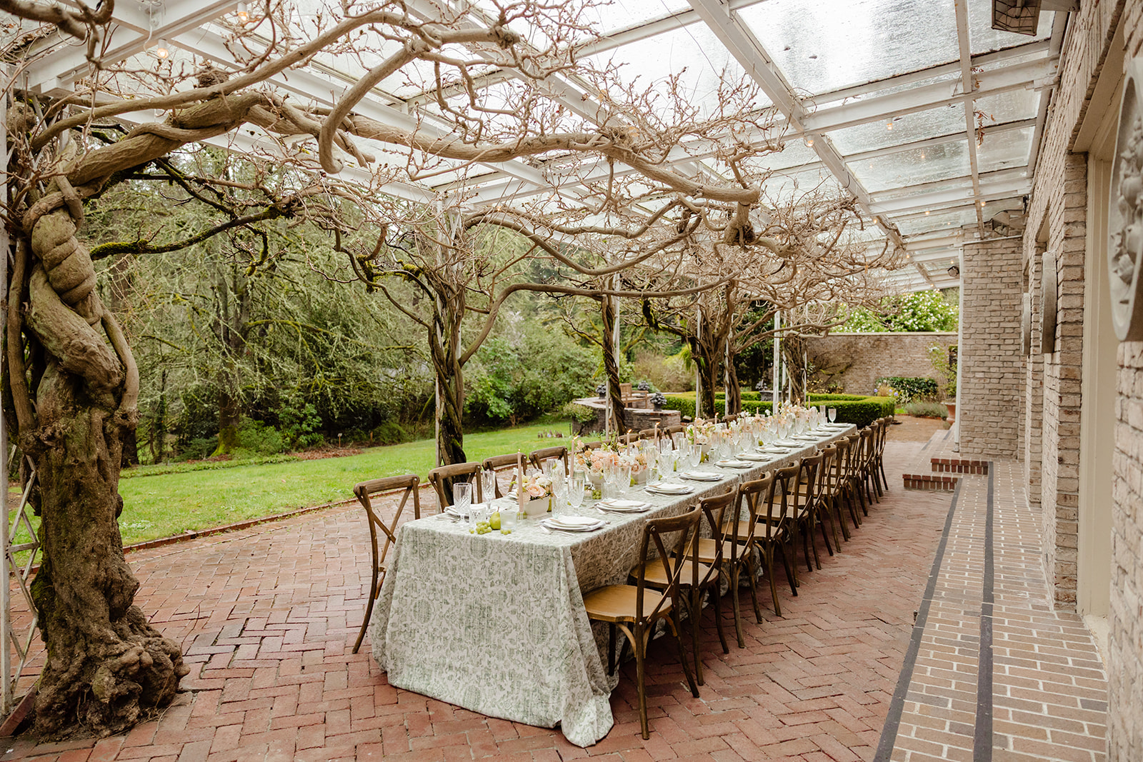 table under awning at lakewold gardens